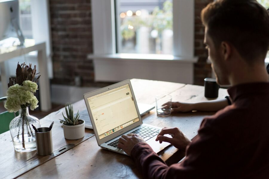 Office worker checking email laptop