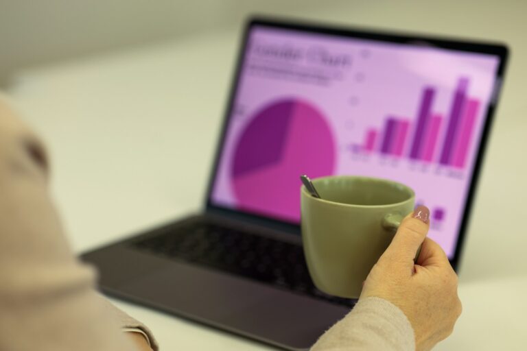Email newsletter analytics dashboard person reading newsletter laptop