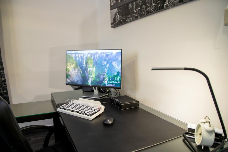 Home office desk monitor keyboard mouse lamp