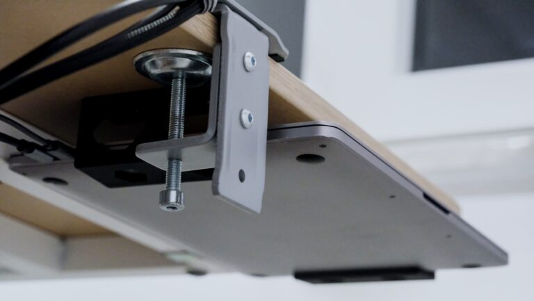 Cable management power strip under desk