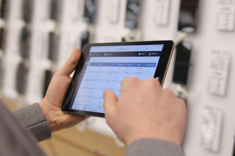 Person using automation app tablet