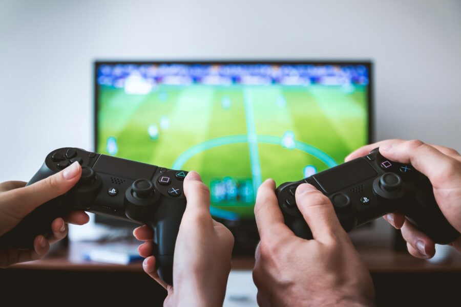 Gamer playing console game controller