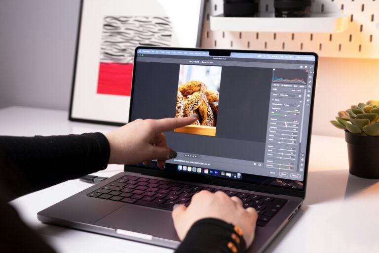 Person editing generated image laptop