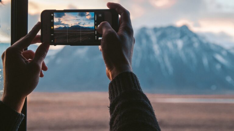 Person using smartphone take photo mobile video recording