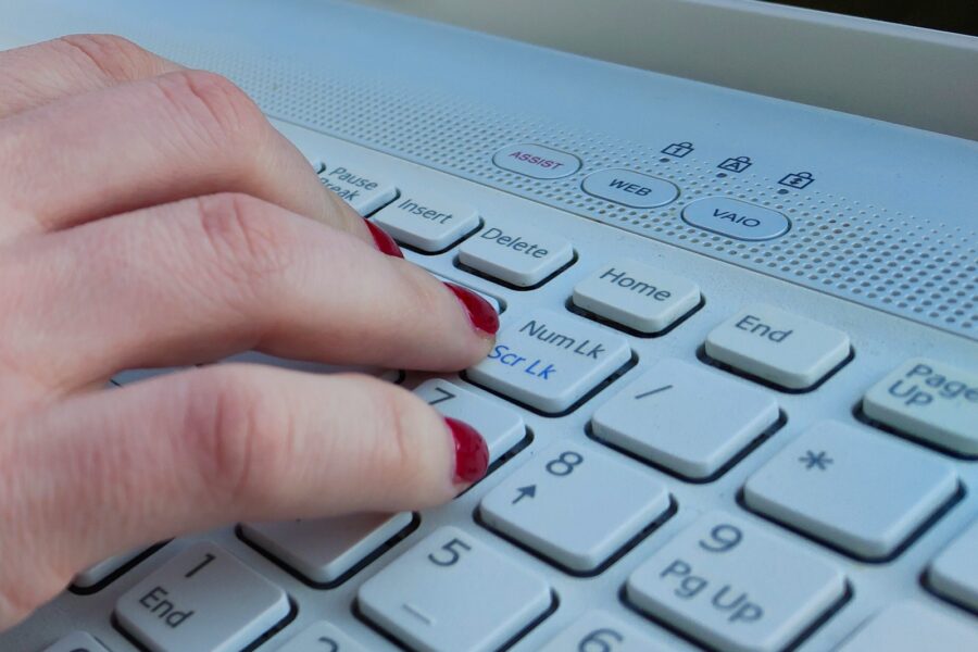 Password manager app laptop keyboard