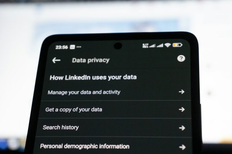 Smartphone privacy settings screen person removing social media