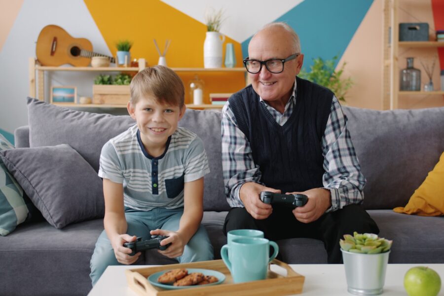Parent child using game console controller living room