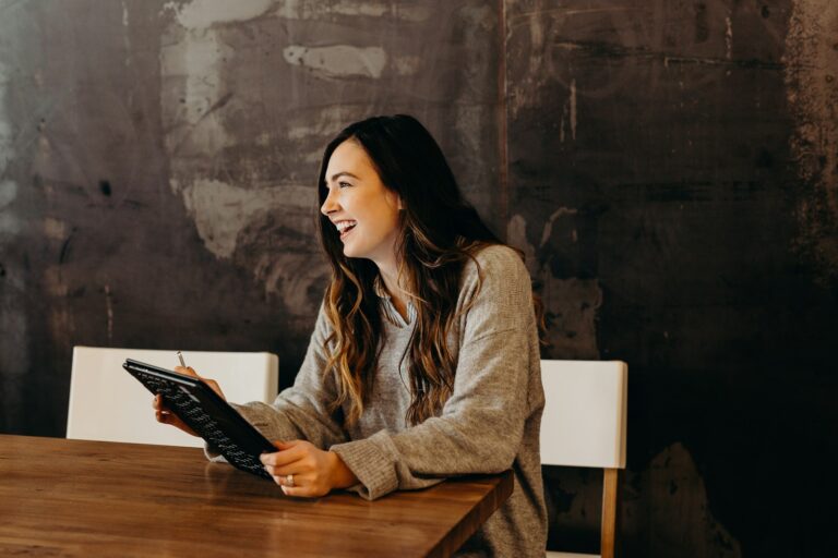 Woman reviewing job offer email