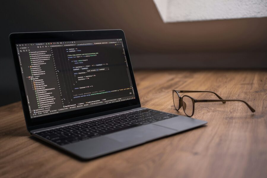 Laptop screen neural network code office desk