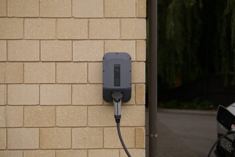 Electric vehicle home charger garage smart plug connected