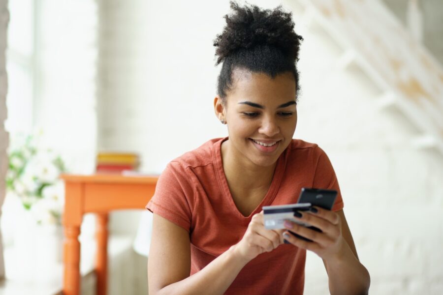 Person using mobile banking app smartphone