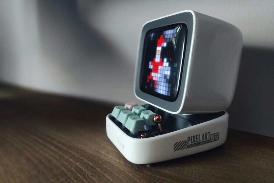 Retro handheld gaming console pixel art screen