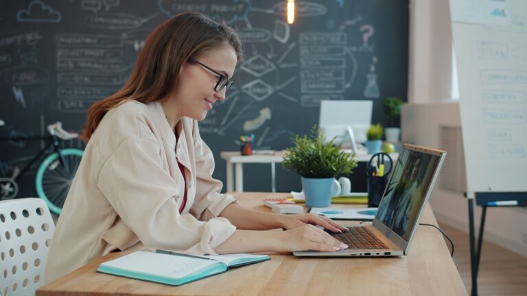 Remote team video call laptop workspace