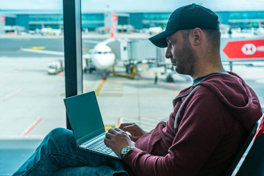 Traveler using laptop