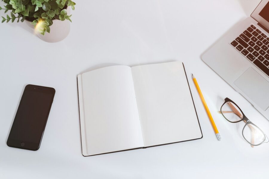 Adult learning app smartphone notebook desk