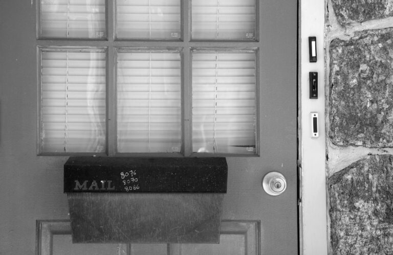 Smart lock front door smartphone hand
