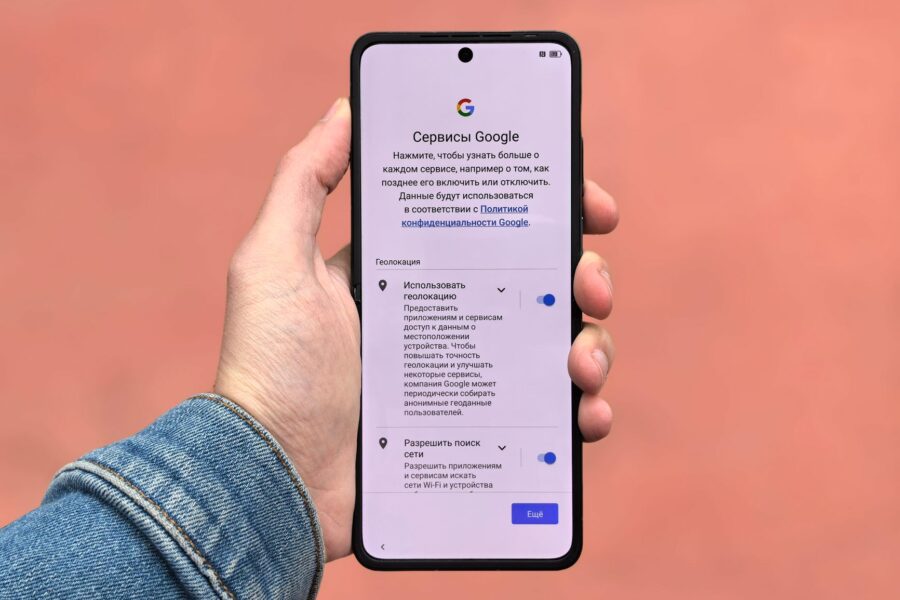 Smartphone hand google photos app screen