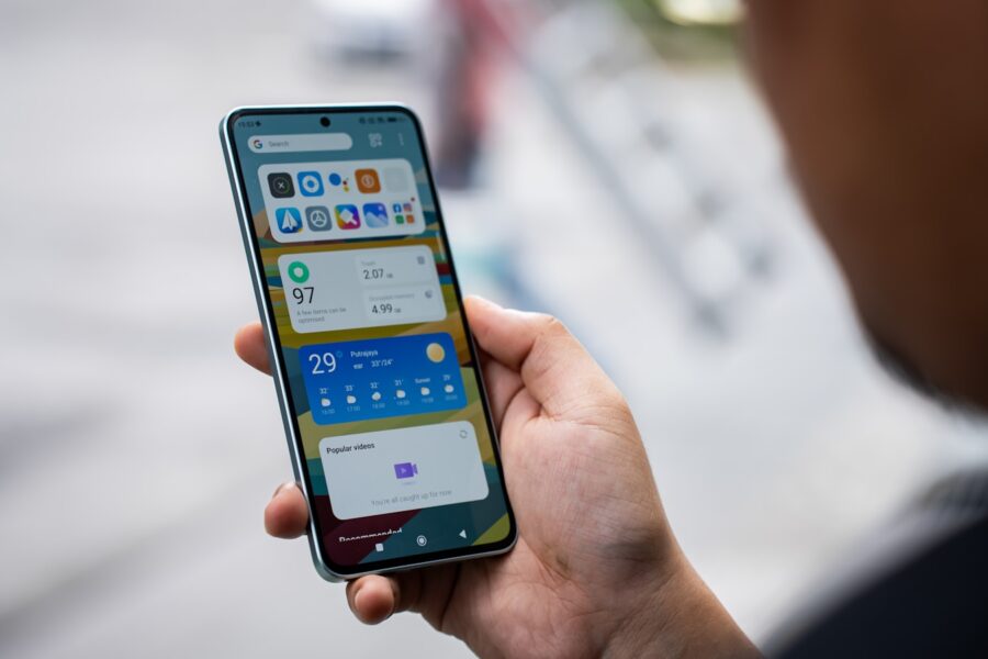 Hand holding smartphone