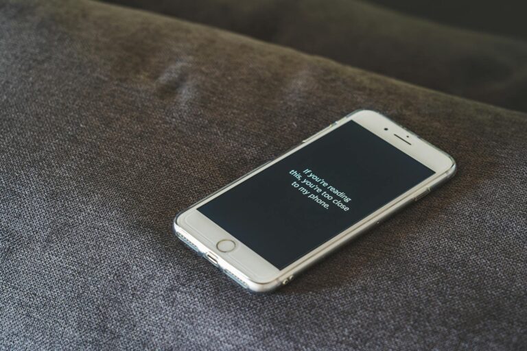 Person adjusting smartphone