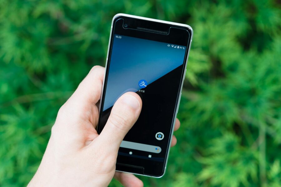 Hand holding smartphone