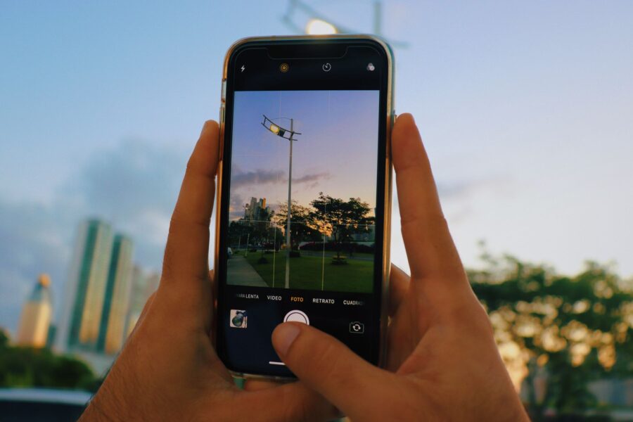 Person taking smartphone